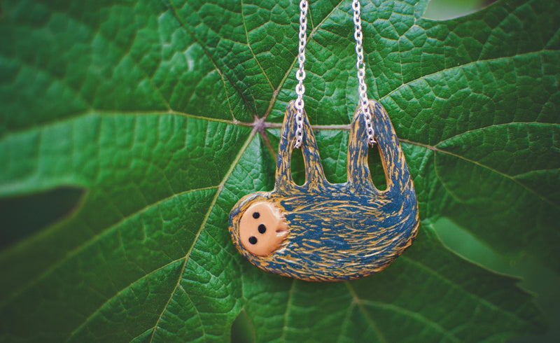 Charm Your Style: Embrace the Playfulness of Sloth Locket Jewelry