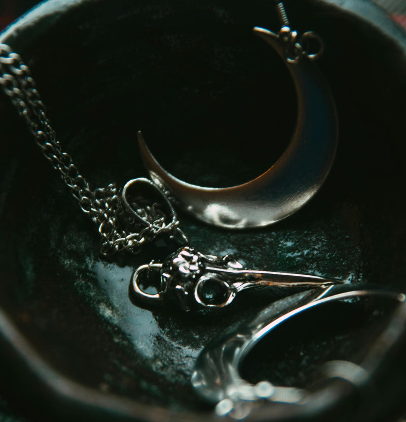 The Black Crescent Moon Necklace: A Blend of Mystery, Elegance, and Symbolism