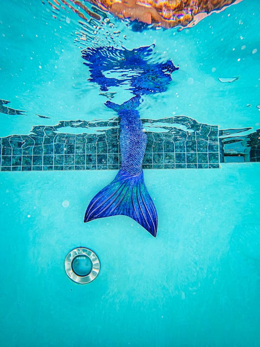 The Enchanting Symbolism of Sterling Silver Mermaid Charms
