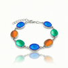 Frosted multicolored gemstone bracelet, with sterling silver bezel components and adjustable links. 