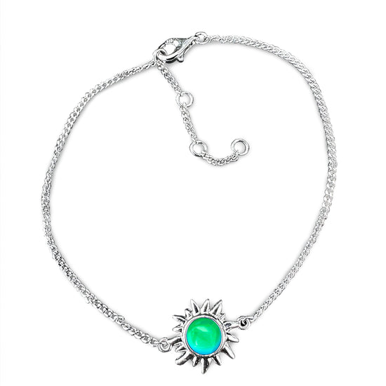 Sun Bracelet with polished green crystal crafted from high-quality sterling silver, it offers both durability and elegance. The bracelet comes with extensions, allowing for a customizable fit. 