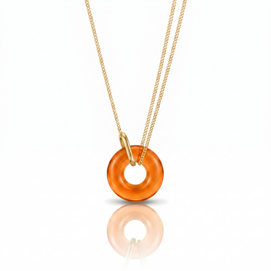 Necklace with an orange pendant on a white background