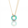 Necklace with a green and blue pendant on a white background