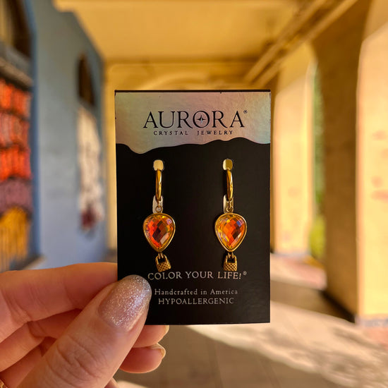Aurora Crystal Jewelry gold hoop earrings with orange crystal drop