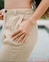 This versatile bracelet features six reversible 5mm stones set in 18k gold PVD-coated stainless steel, offering sophisticated styling flexibility with every wear.