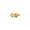 Gold ring with sun and moon design on a white background