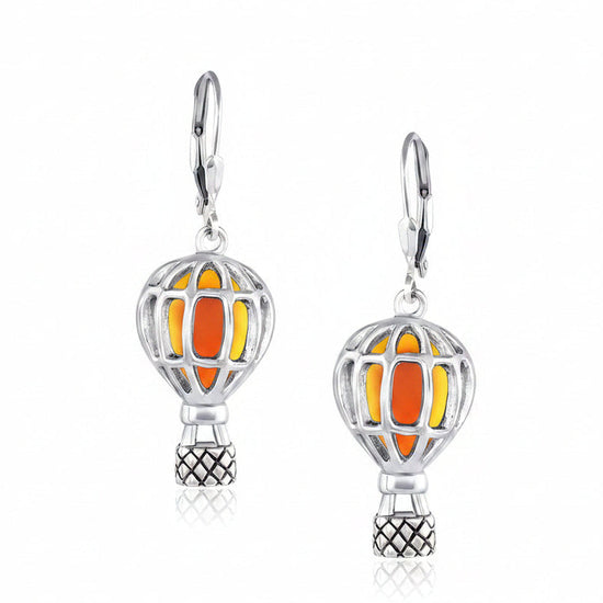 A pair of sterling silver balloon earrings with orange and yellow stone setters.