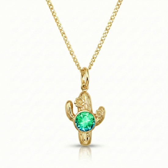 Gold cactus-shaped pendant with a green gemston