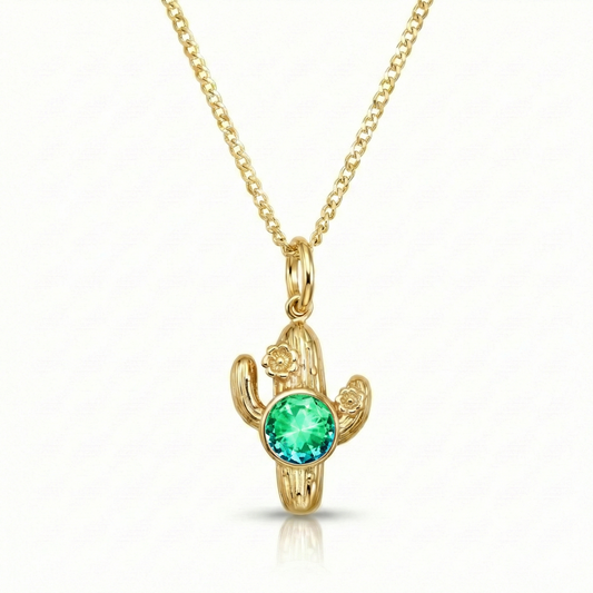 Gold cactus-shaped pendant with a green gemston