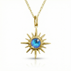 Gold sun-shaped pendant with a blue gemstone.