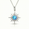 Silver sun-shaped pendant with a blue gemstone.