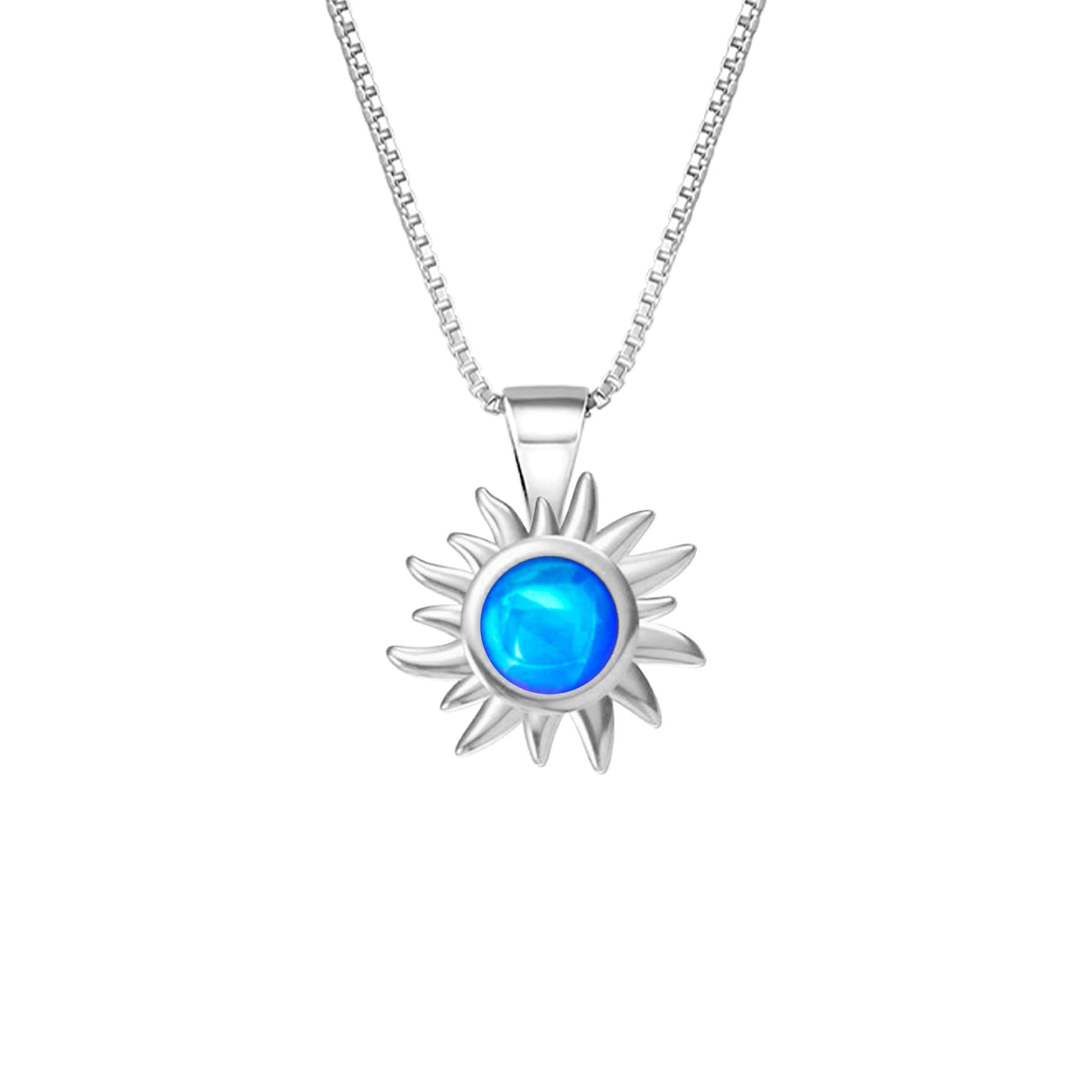 Teeny Sun Pendant Necklace crafted from high-quality .925 sterling silver, featuring a stunning 5mm frosted blue stone and it comes complete with an 18" sterling silver box chain.