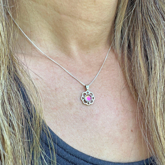 Teeny Loop Pendant features a stunning 5mm polished pink stone and comes with a .7mm sterling silver 18" box chain.