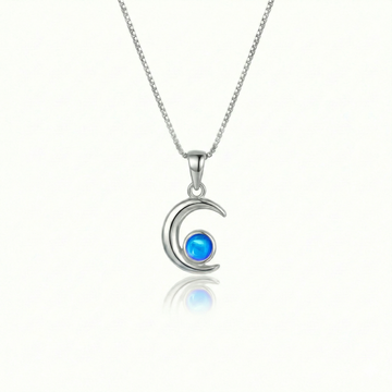 Moon Pendant crafted from high-quality materials, comes with an 18" sterling silver  chain and 5mm polished blue stone.