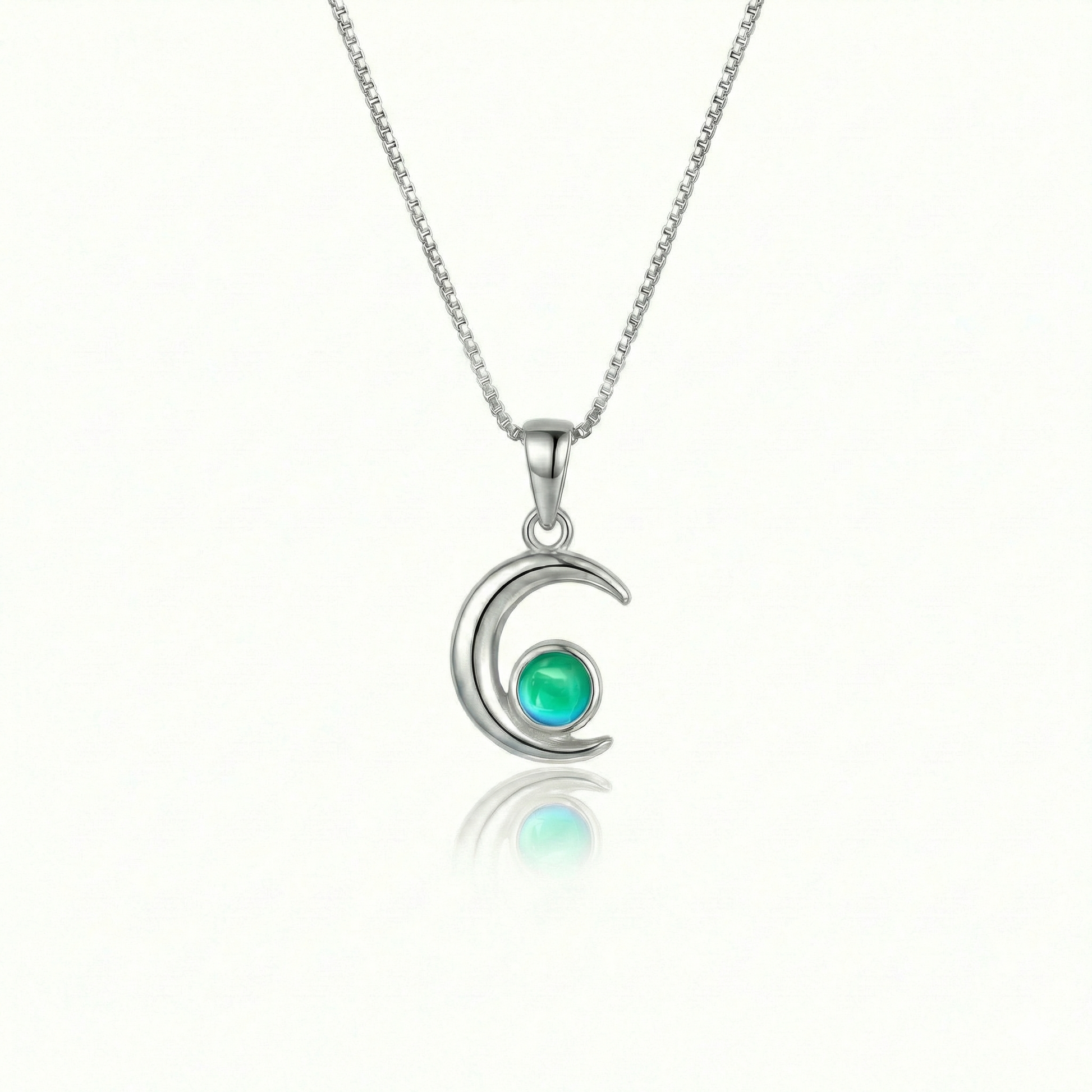 Moon Pendant crafted from high-quality materials, comes with an 18" sterling silver  chain and 5mm polished green stone.
