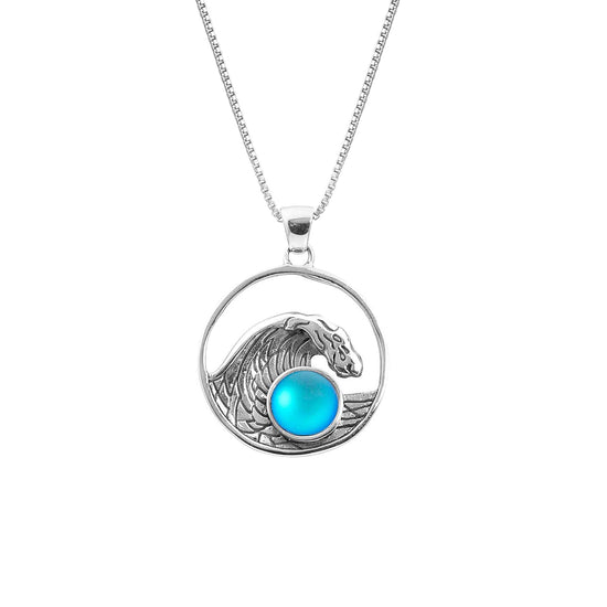Swell Pendant are crafted in 18" sterling silver .7mm box chain wave pendant with round frosted aqua crystal.