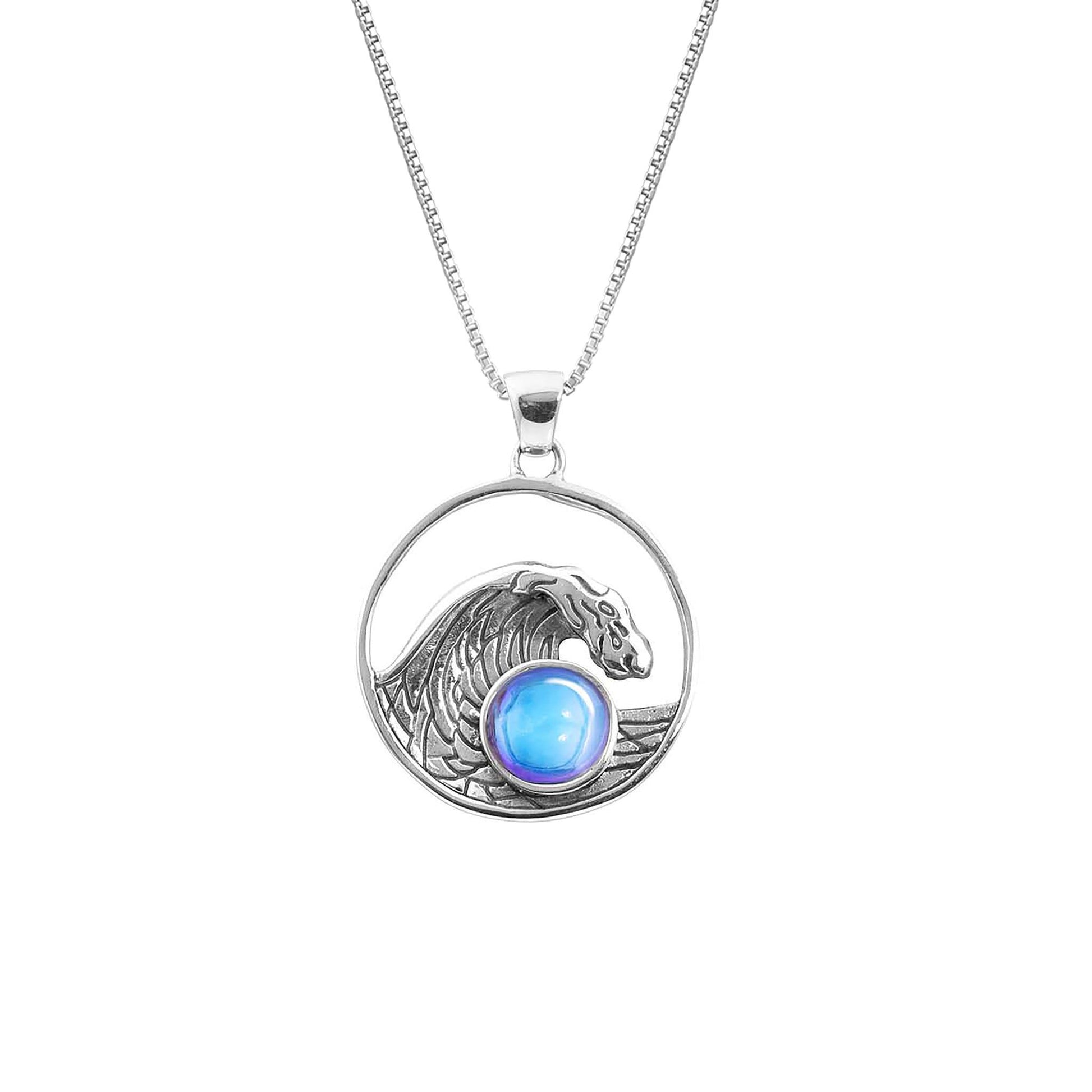 Swell Pendant are crafted in 18" sterling silver .7mm box chain wave pendant with round polished blue crystal.