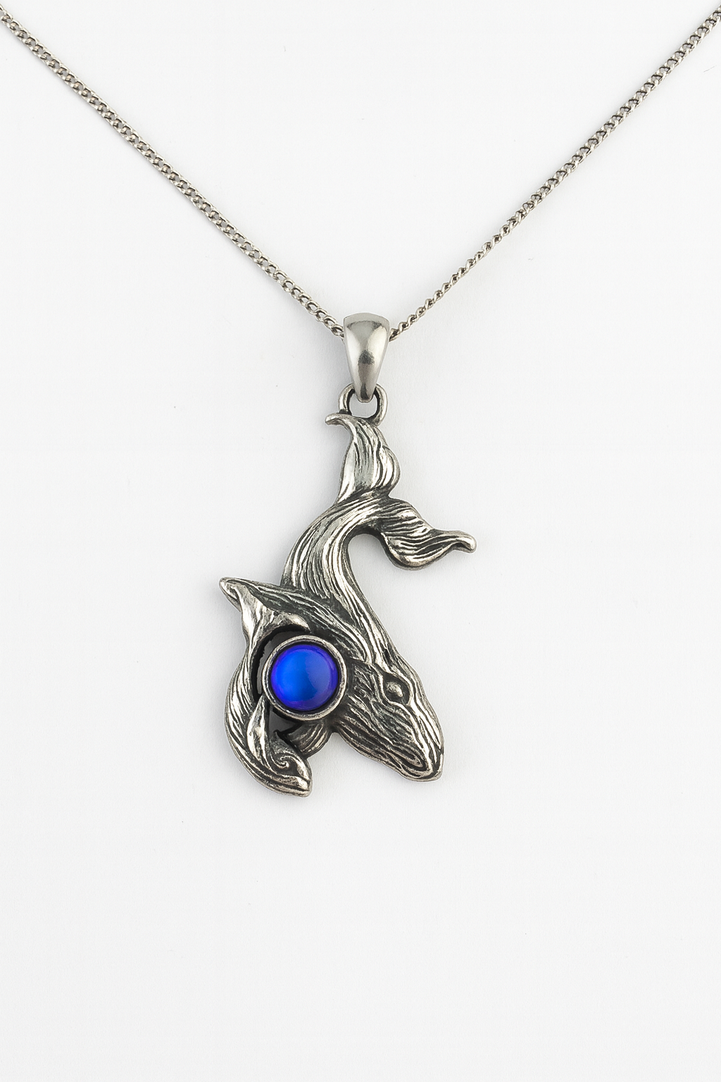 Gold humpback whale with baby pendant necklace featuring a detailed mother and calf design on a delicate chain