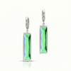 Pair of silver earrings with green rectangular stones on a white background