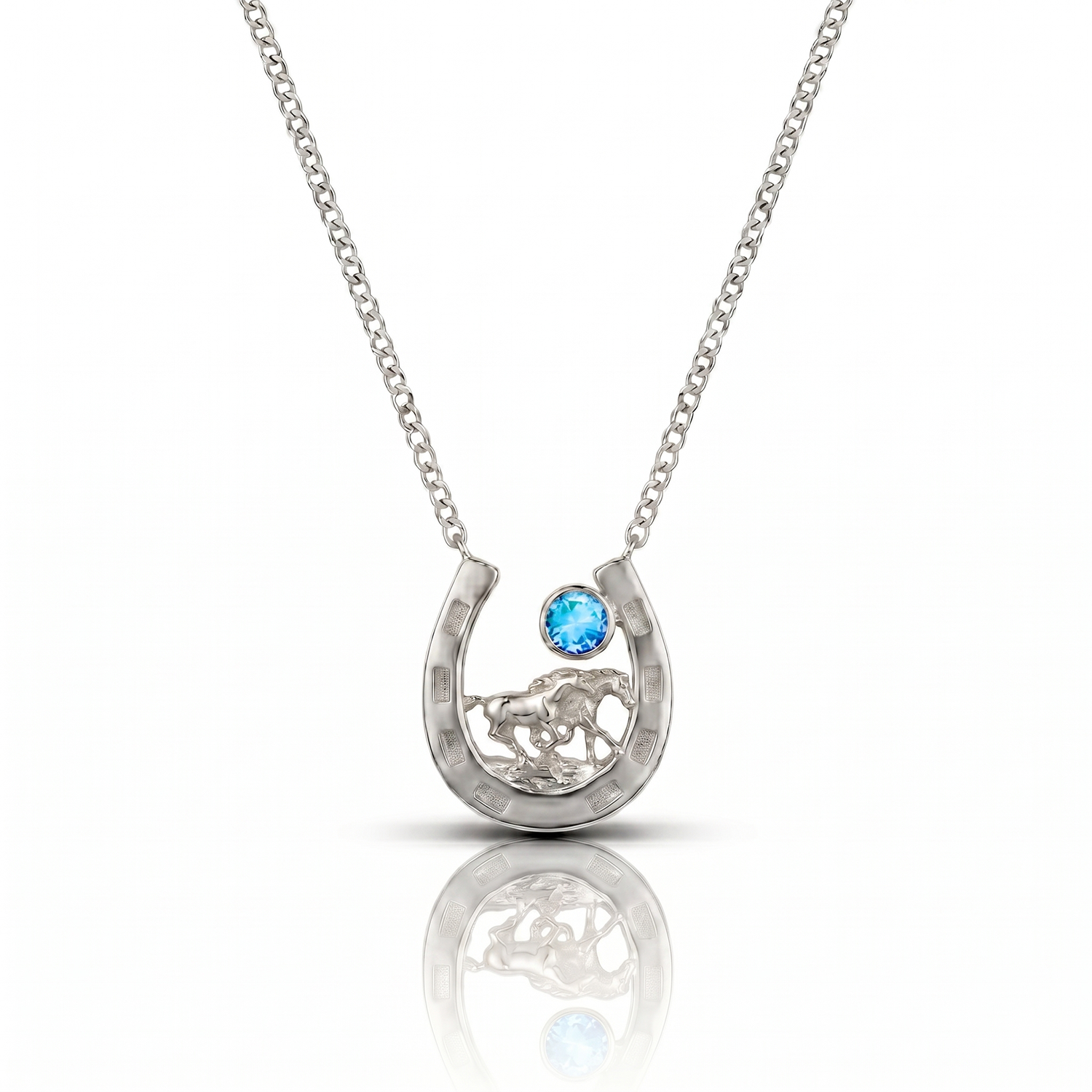 Silver necklace with a horseshoe pendant featuring a blue gemstone on a white background