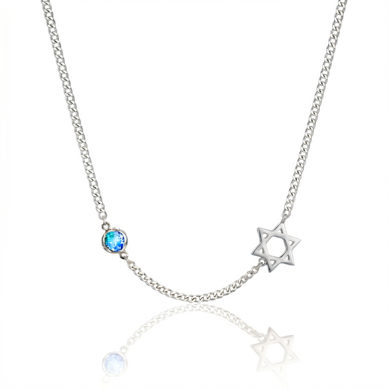 Necklace with a star-shaped pendant and blue gemstone on a white background