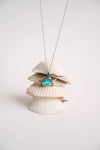 This adorable baby turtle pendant is available in shimmering blue or green, with your choice of stainless steel or 18K gold over stainless. The head, arms, and legs move, adding playful character to this instant favorite. Designed for everyday wear—whether you're at work, in the ocean, or off on your next adventure. 