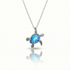 Baby Turtle pendant in shimmering blue stone with stainless steel. Comes with a 1mm adjustable 16–18" chain.