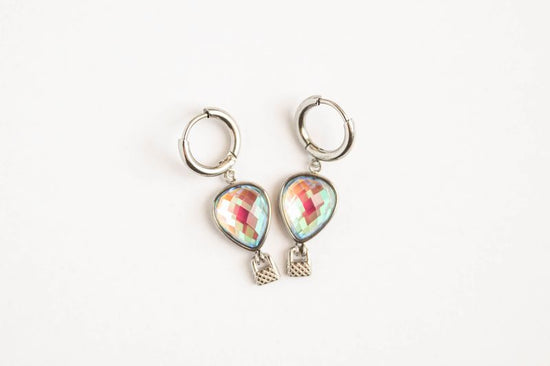 whimsical balloon earrings, featuring delicate hot air balloon charms with movable basket details.