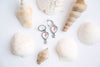 Elevate your jewelry collection with these whimsical balloon earrings, featuring delicate hot air balloon charms with movable basket details. Each earring showcases expertly crafted stonework that catches the light beautifully. 