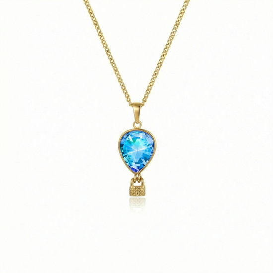 Gold necklace with a blue pendant featuring a delicate hot air balloon charm on a fine chain