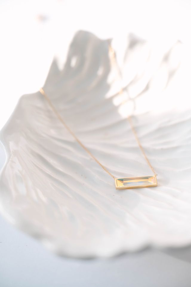 Bar Necklace, a sleek and modern addition to your jewelry collection. Crafted to perfection, this pendant exudes elegance, making it a versatile choice for both casual and formal occasions. 