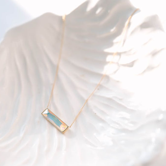 Bar Necklace, a sleek and modern addition to your jewelry collection. Crafted to perfection, this pendant exudes elegance, making it a versatile choice for both casual and formal occasions. 