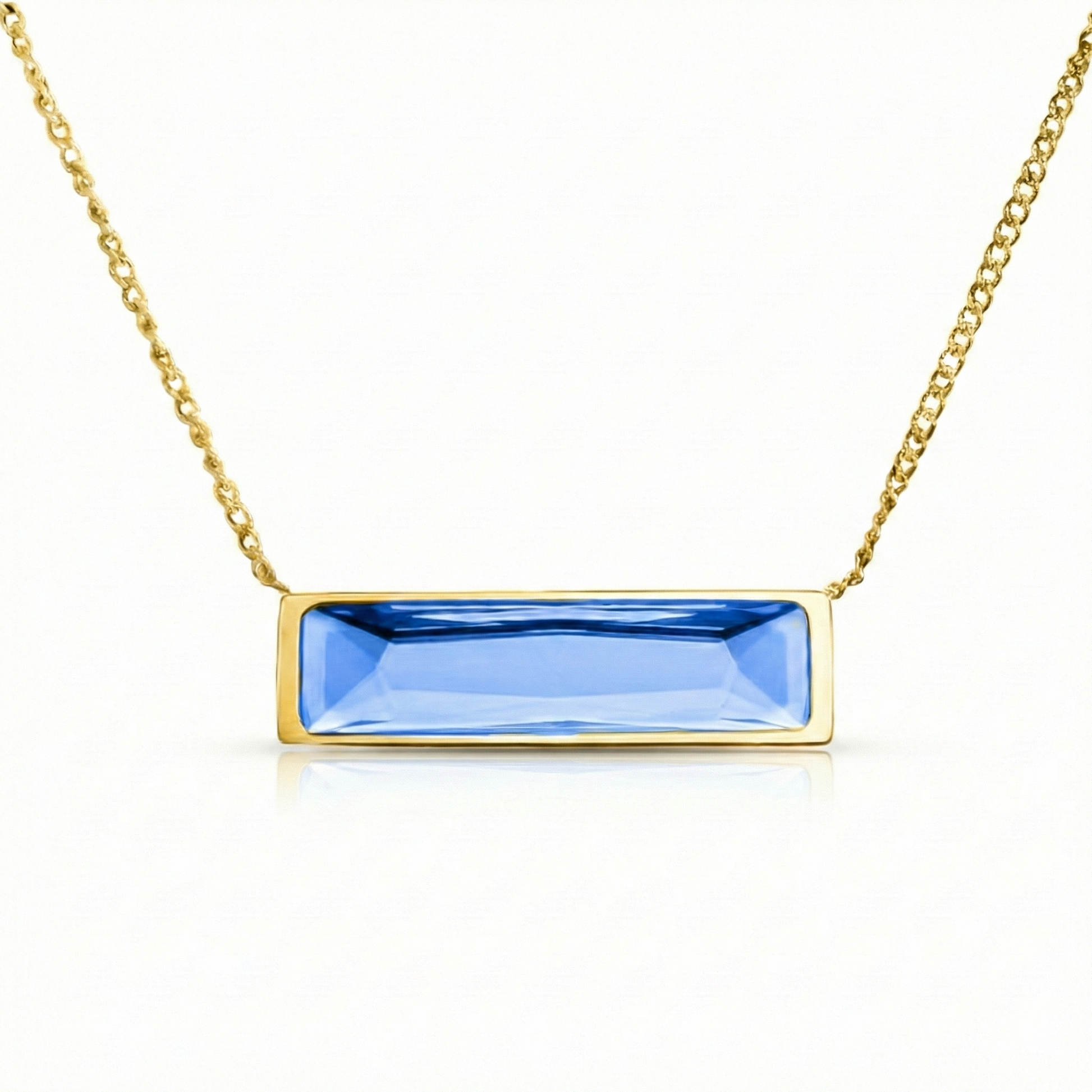 Gold necklace with a blue rectangular pendant 