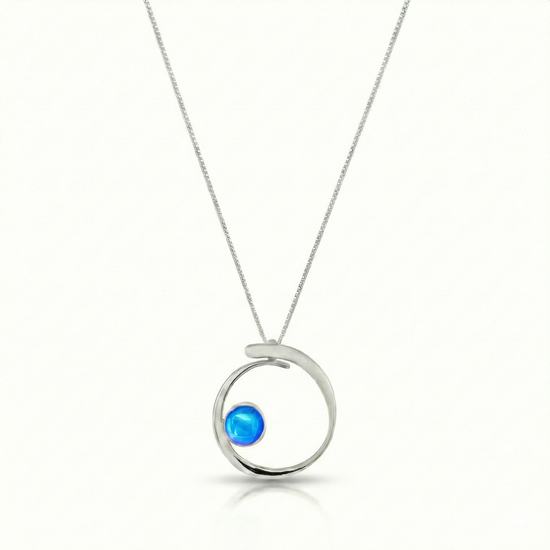 Barrel Pendant features a simple yet striking design that beautifully emulates the movement of a barrel within a wave. Crafted from high-quality sterling silver with polished blue crystal.