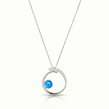 Barrel Pendant features a simple yet striking design that beautifully emulates the movement of a barrel within a wave. Crafted from high-quality sterling silver with polished blue crystal.
