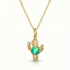 Gold cactus-shaped pendant with a green gemston