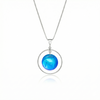 Circle with Loop Pendant featuring a simple round crystal beautifully encircled by a .925 sterling silver loop. The polished blue pendant comes with an 18" sterling silver .7mm box chain included.