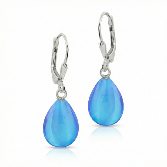  Dangle Crystal Drop Earrings are the perfect choice. Crafted with .925 sterling silver lever-back components with stunning aurora borealis iridescent polished blue crystals to take center stage.