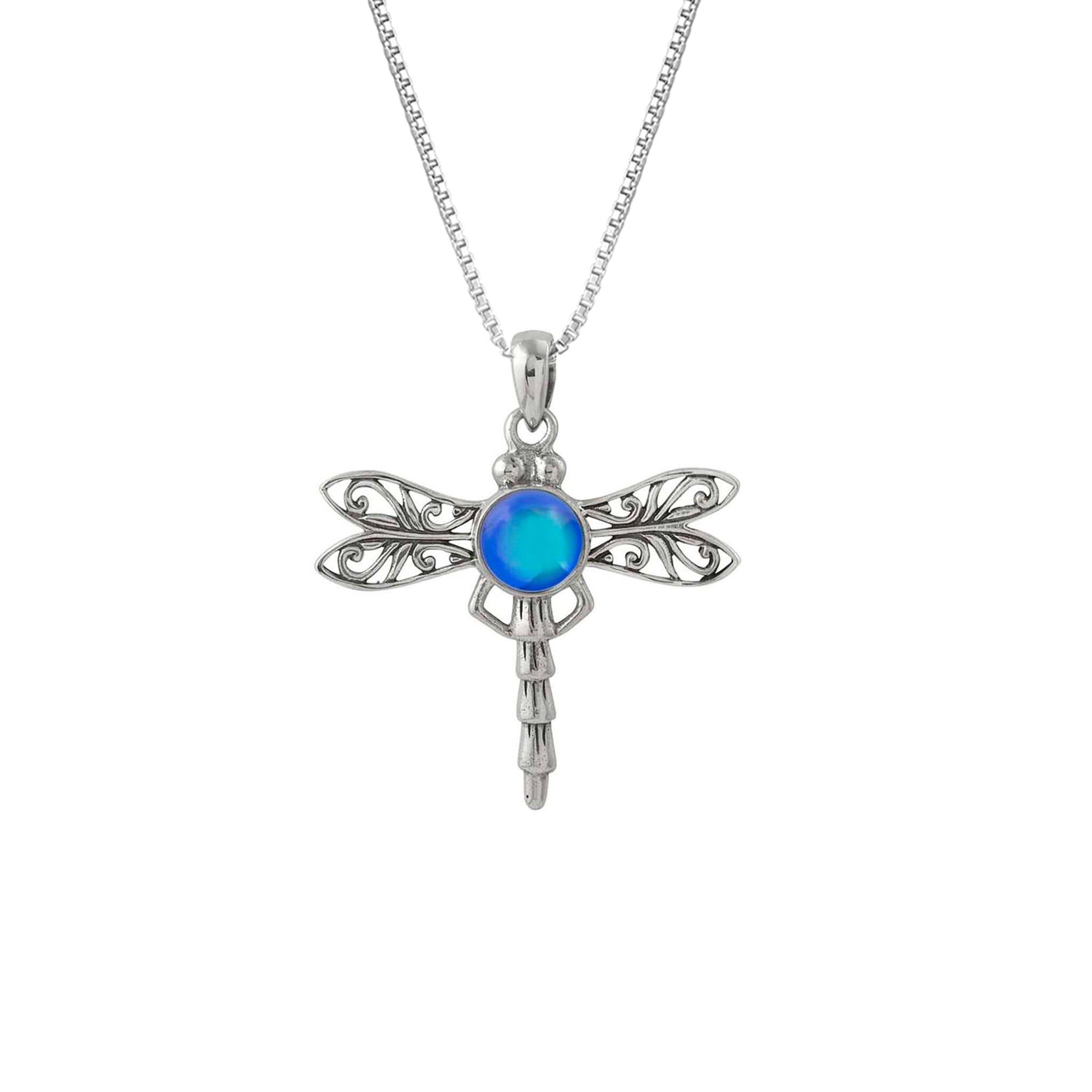 Dragonfly Pendant, this handmade pendant features a stunning glowing polished violet crystal, elegantly surrounded by intricate silver details in the dragonfly's wings and body. The pendant comes with an 18" sterling silver .7mm box chain included.
