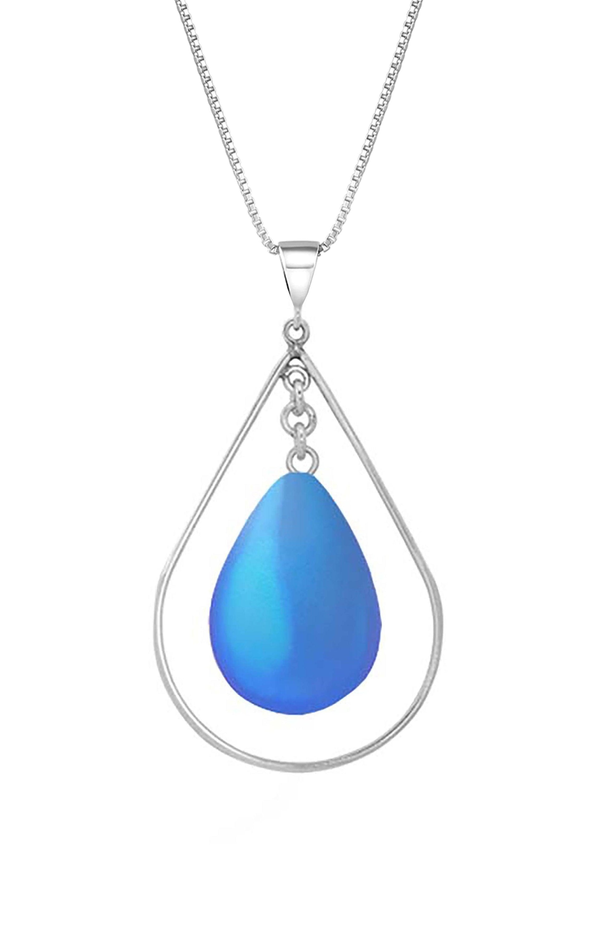 Drop with Loop Pendant  is a classic design that elegantly radiates with frosted blue pendant. It comes with an 18" .7mm sterling silver box chain, ensuring a complete and polished look.