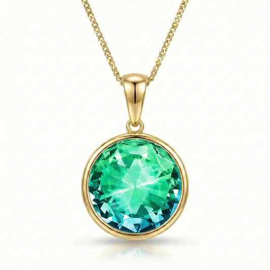 Eclipse Crystal Pendant is perfectly shaped as a 16mm circle green stone, crafted with precision and care in 18k gold stainless, it features a 16"-18" adjustable chain.