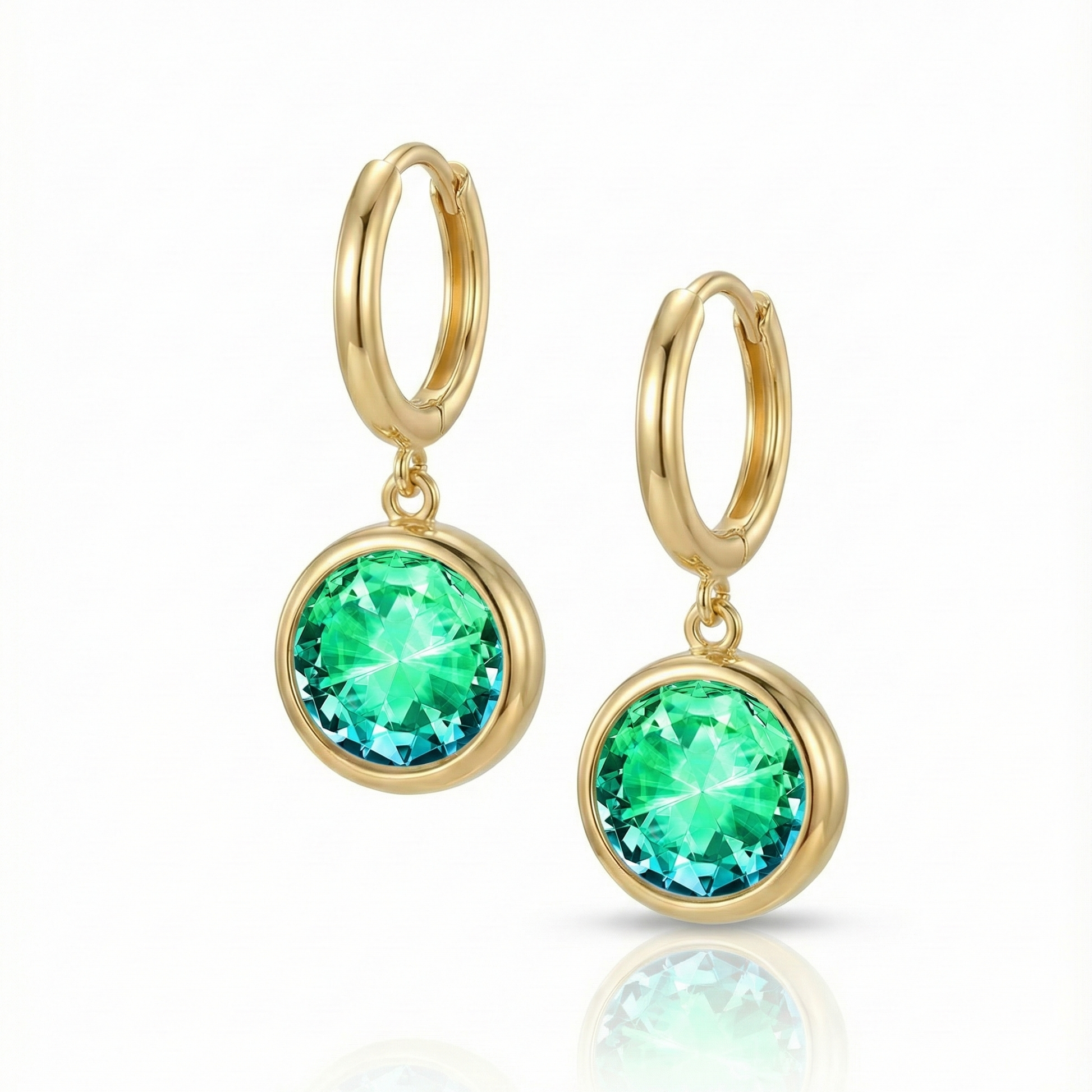 Eclipse Hoop Earrings are perfectly sized with a 9mm round green circle and an 11mm 18K gold stainless hoop diameter. These earrings are crafted to add a subtle yet striking touch of sophistication to your everyday ensemble.