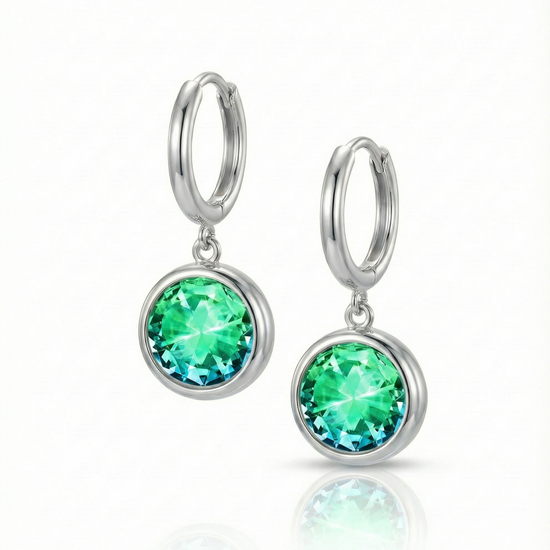 Eclipse Hoop Earrings are perfectly sized with a 9mm round green circle and an 11mm silver stainless hoop diameter. These earrings are crafted to add a subtle yet striking touch of sophistication to your everyday ensemble.