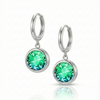 Eclipse Hoop Earrings are perfectly sized with a 9mm round green circle and an 11mm silver stainless hoop diameter. These earrings are crafted to add a subtle yet striking touch of sophistication to your everyday ensemble.