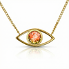 Gold necklace with eye-shaped pendant featuring a colorful gemstone.