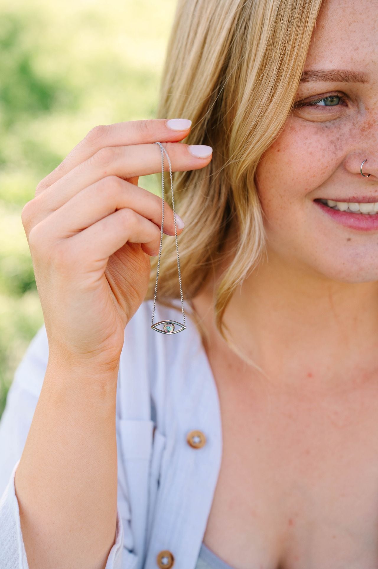 Evil Eye Necklace, a stunning addition to our Pendants collection. Each piece is handcrafted, symbolizing protection and spiritual insight. This elegant necklace not only serves as a fashion statement but also as a talisman to ward off negativity and bring good luck to the wearer. 