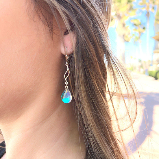 Feather Ext. Earrings with polished blue pendant, comes with .925 sterling silver lever-backs for secure and comfortable wear.