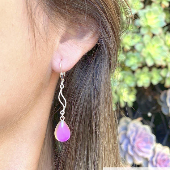 Feather Ext. Earrings with polished pink pendant, comes with .925 sterling silver lever-backs for secure and comfortable wear.