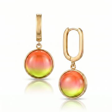 Gold earrings with colorful round stones on a white background