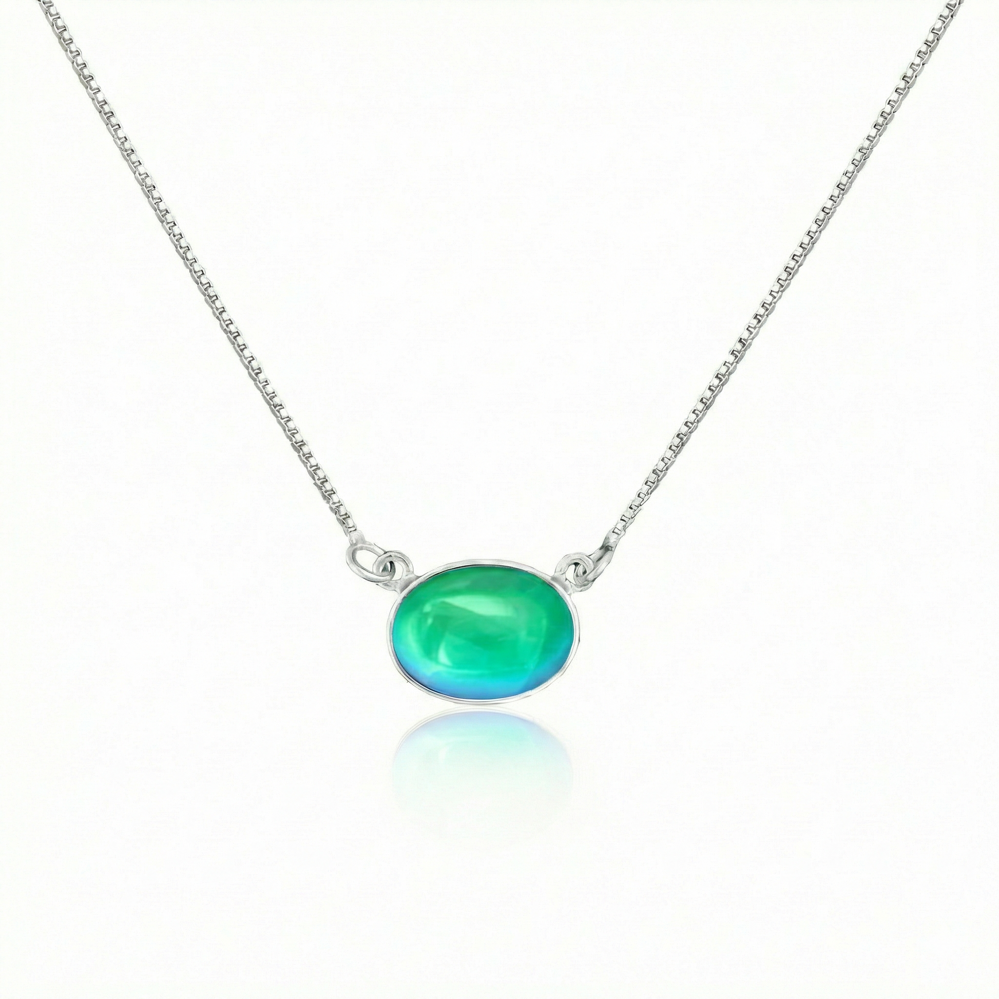 H-Oval Pendant featuring a polished green stone sleek oval design, this elegant piece exudes sophistication and style. Crafted from high-quality sterling silver. It comes with a 16" sterling silver box chain in a choker design.